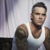 Robbie Williams announces new album ‘BRITPOP’, shares blistering single with Black Sabbath’s Tony Iommi