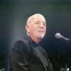 Billy Joel misses documentary premiere amid brain condition diagnosis, says he “will be back”