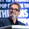 Huey Lewis says he won’t “give up” recording music despite hearing loss
