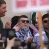 Huge crowd gathers as Kneecap’s Mo Chara appears in court over terrorism charges: “We are on the right side of history”